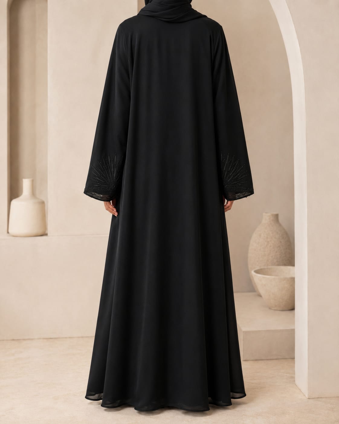 Arabian Open Embroidery Frock in black, back view showing flowing silhouette and cuff embroidery