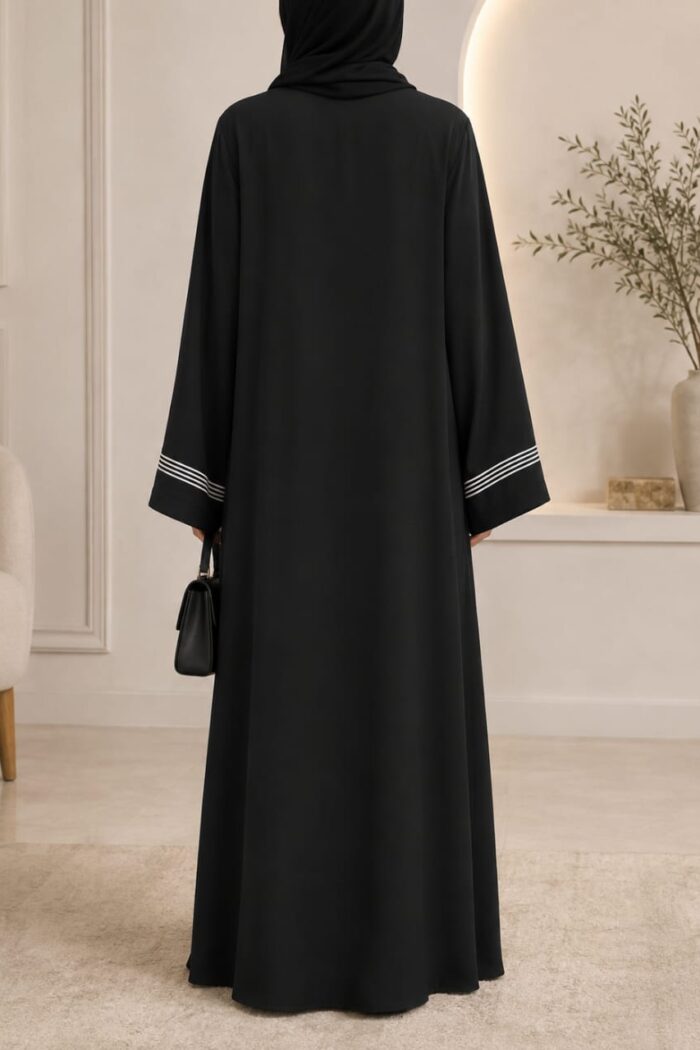 Black dori embroidered tasal gown with striped cuffs - back view
