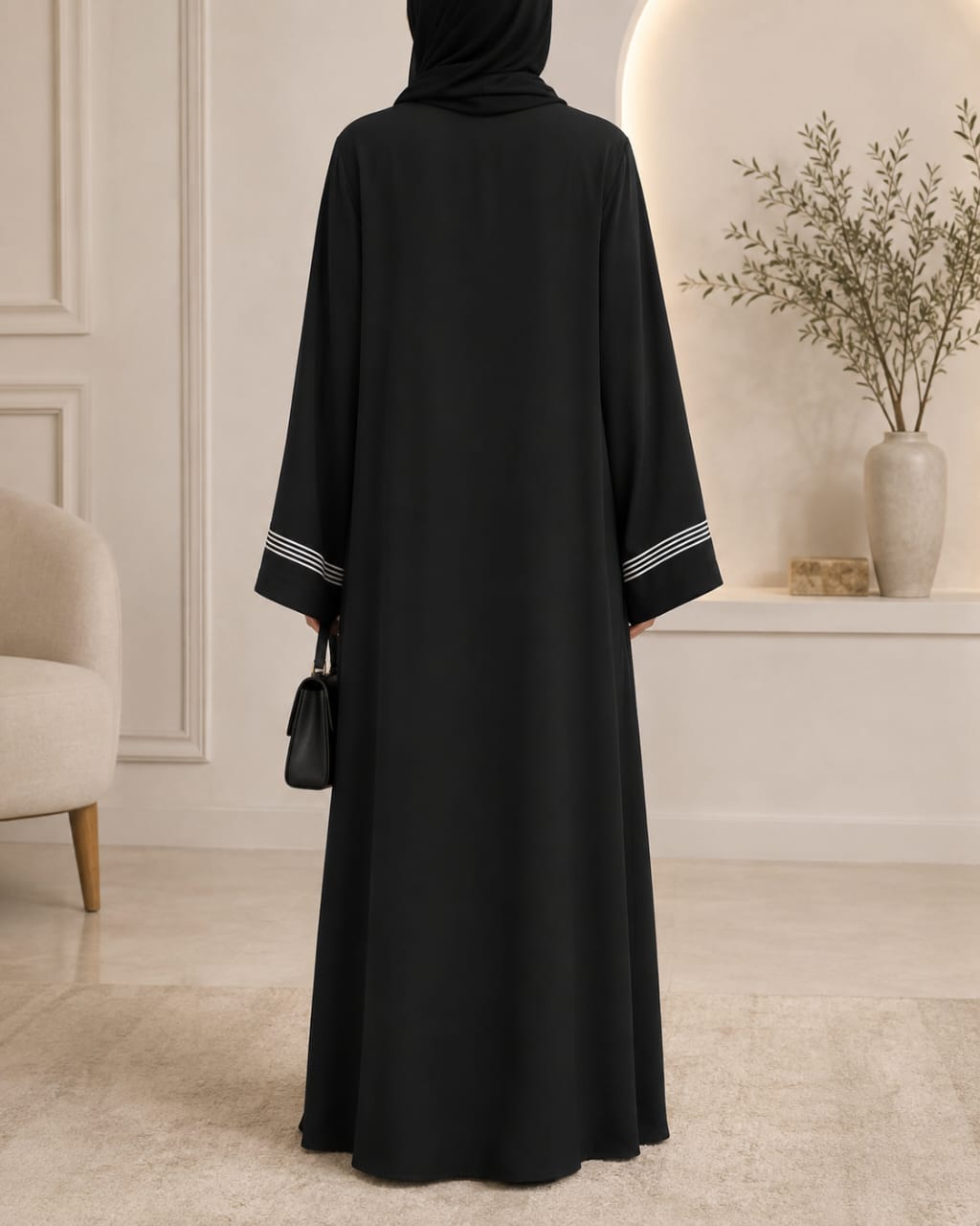 Black dori embroidered tasal gown with striped cuffs - back view