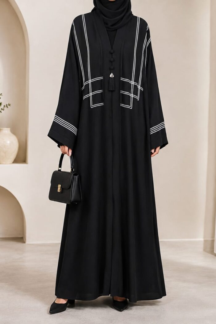Black dori embroidered tasal gown with geometric chest panel - front view