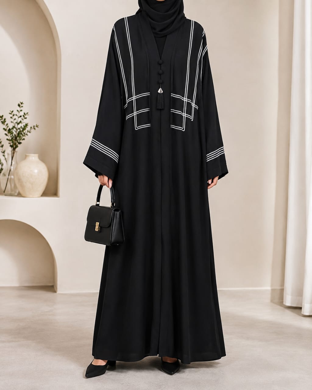 Black dori embroidered tasal gown with geometric chest panel - front view