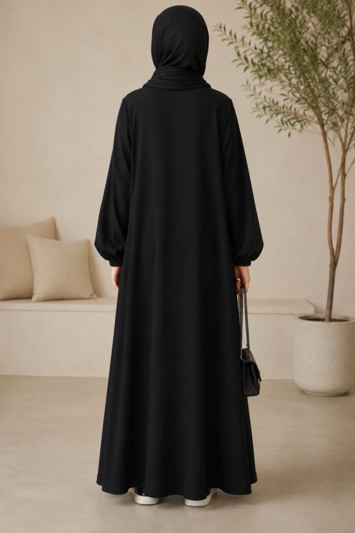 Black Matwaze teen abaya back view with matching hijab and cuffed sleeves