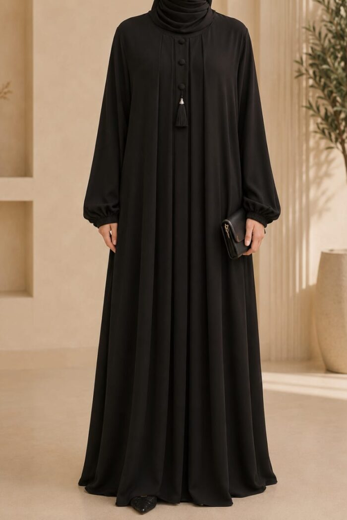 Black tassel abaya front view with decorative buttons and tassel detail
