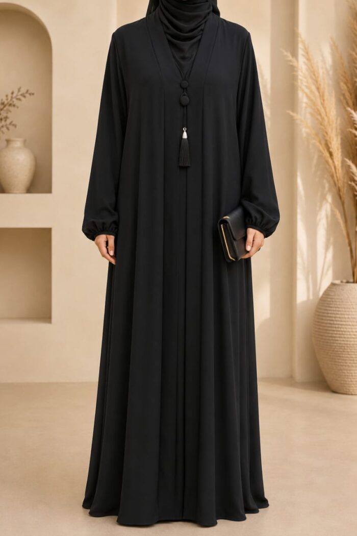 Black zoom tassel abaya front view with V-neck tassel closure detail