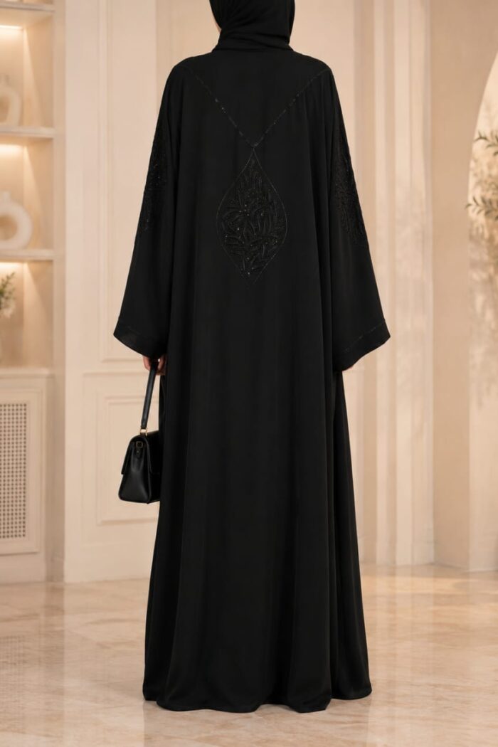 Black open frock stone nag abaya back view with leaf motif embroidery
