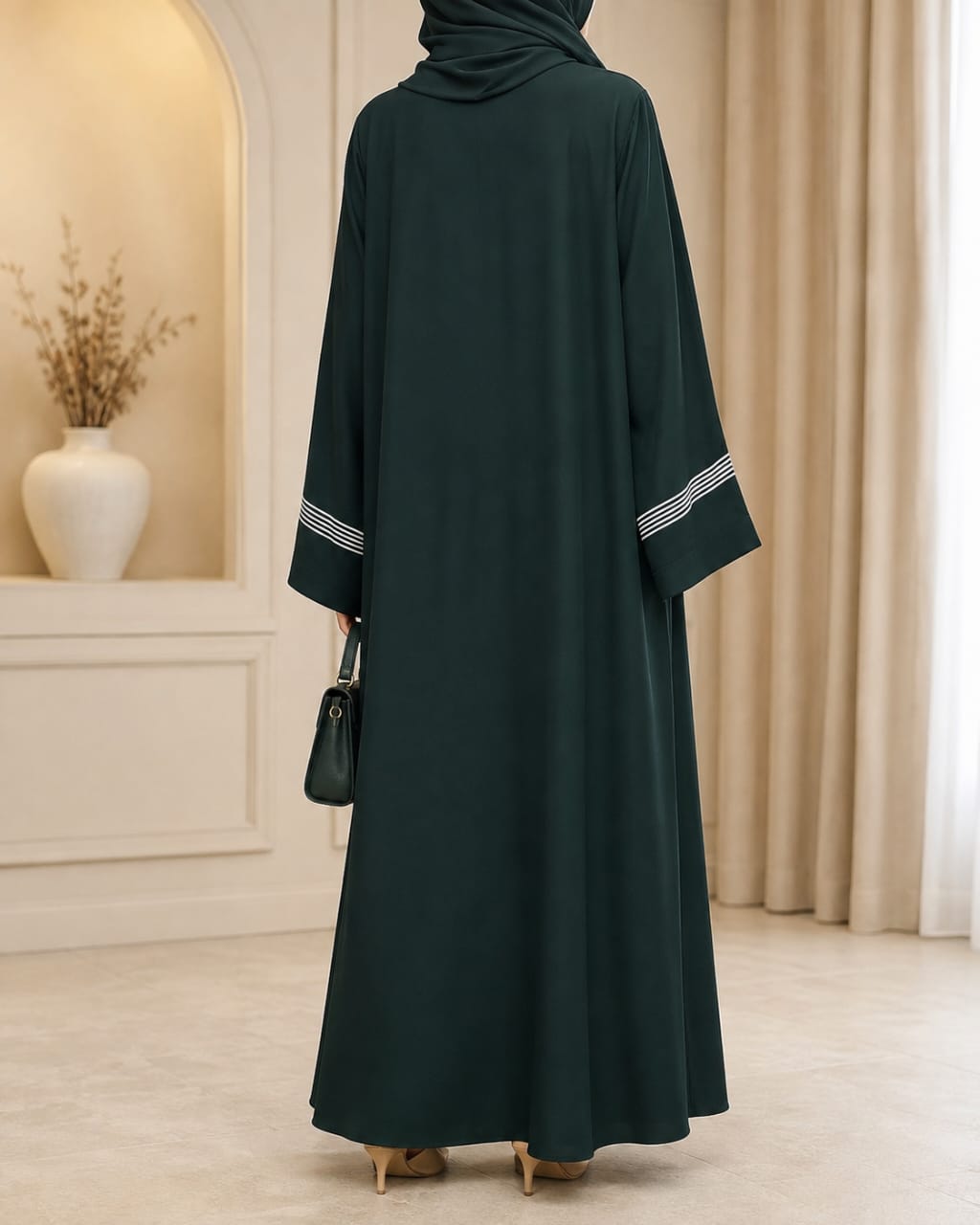 Bottle green dori embroidered tasal gown with striped cuffs - back view