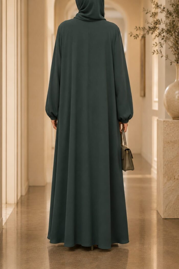 Bottle green zoom tassel abaya back view with matching hijab and gathered sleeves