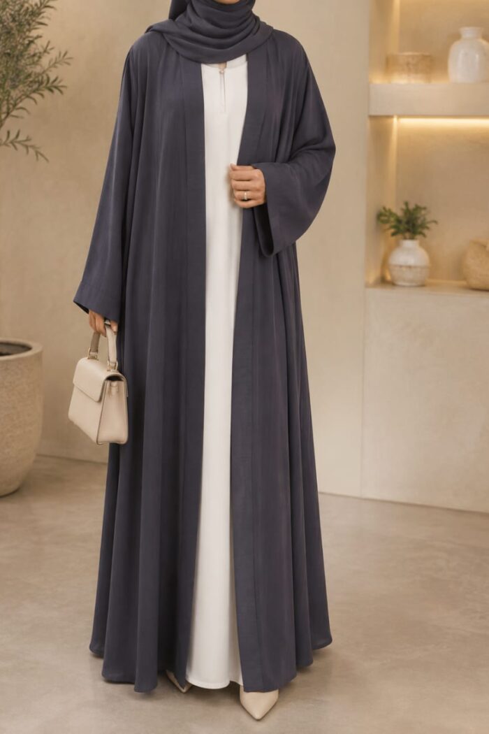 Dark grey lining abaya open front style worn over white inner Nida dress