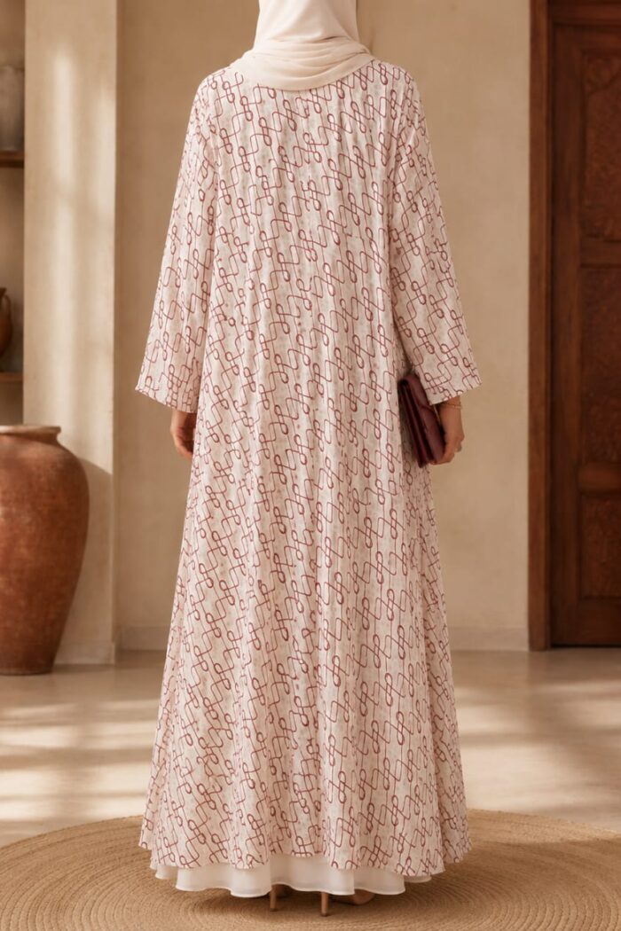 Falcon Printed Pearl Abaya in maroon, back view showing layered geometric print and flowing silhouette