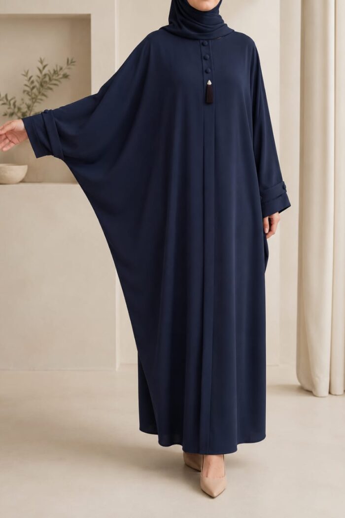 Kaftan bagi abaya in charcoal with tassel neckline - front view