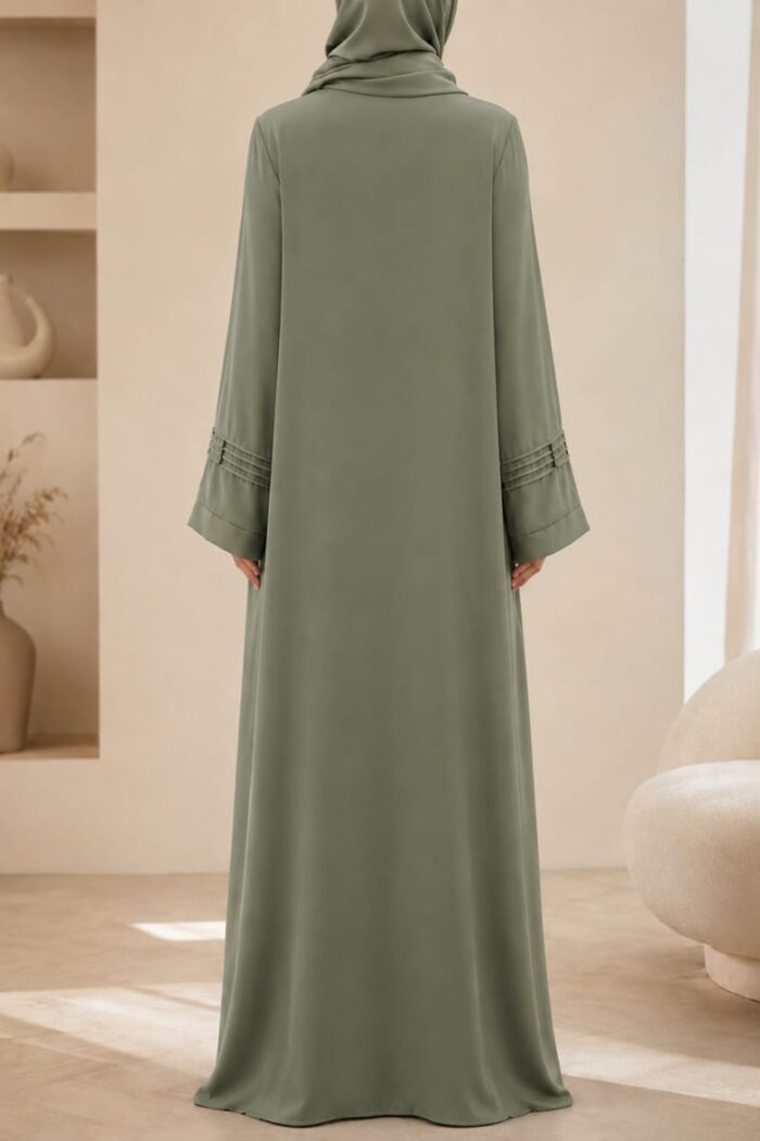 Lake green plates stone abaya back view with matching hijab and pleated cuffs