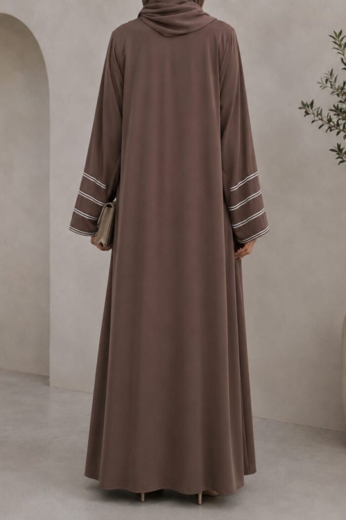 Light brown dori embroidered abaya with striped cuffs - back view