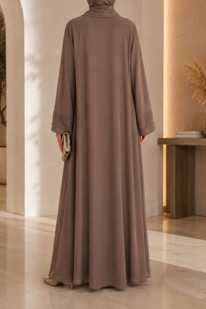 Light brown plates stone abaya back view with matching hijab and pleated cuffs