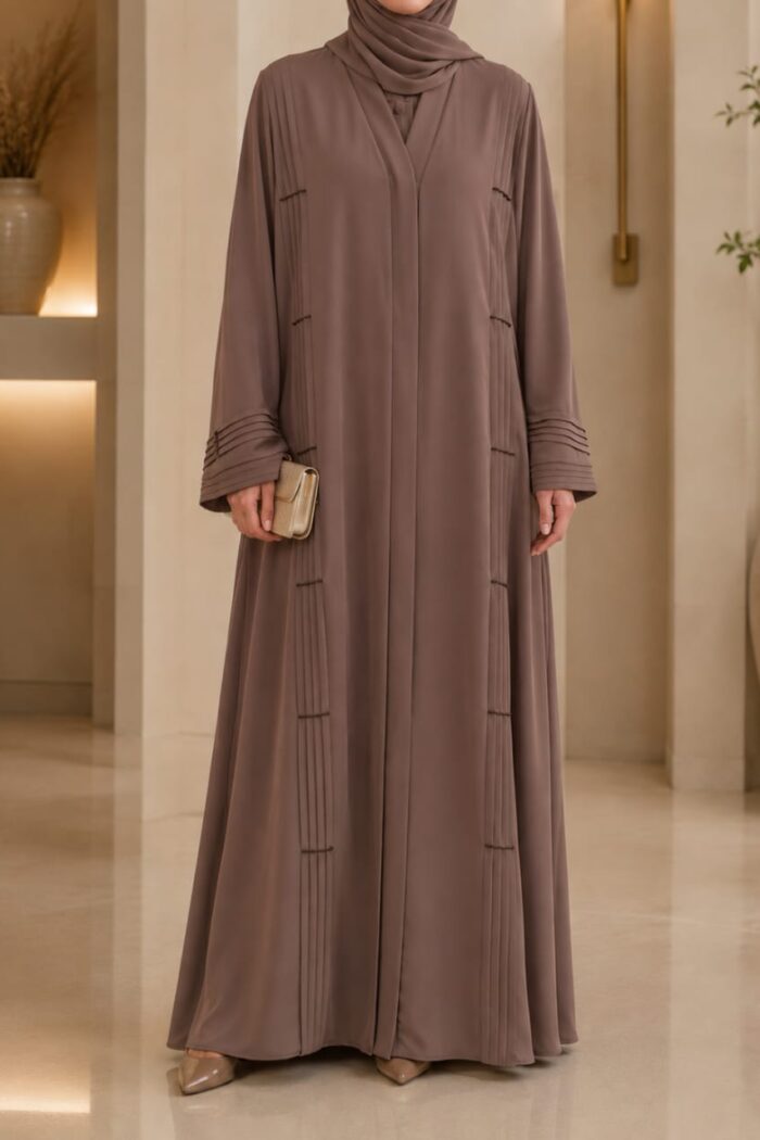 Light brown plates stone abaya front view with vertical pleated plates