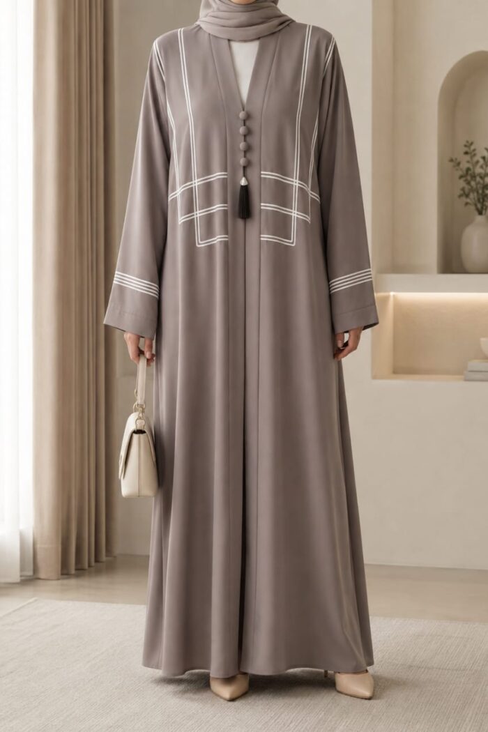 Light grey dori embroidered tasal gown with geometric chest panel - front view