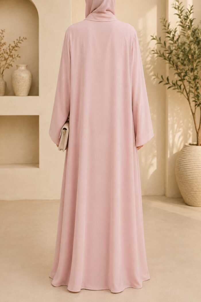 Light pink medallion abaya back view with matching hijab and cuffed sleeves