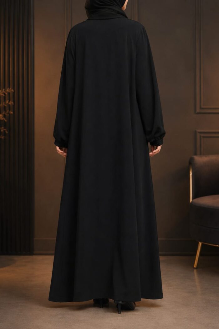 Matwaze abaya in black with puff sleeve cuff - back view