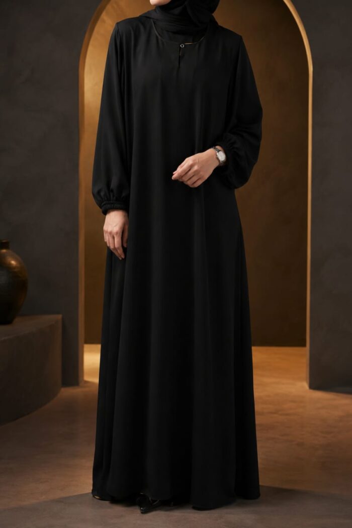 Matwaze abaya in black with elasticated cuff - front view