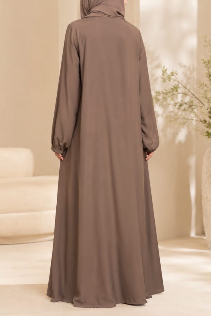 Matwaze abaya in camel brown with puff sleeve cuff - back view