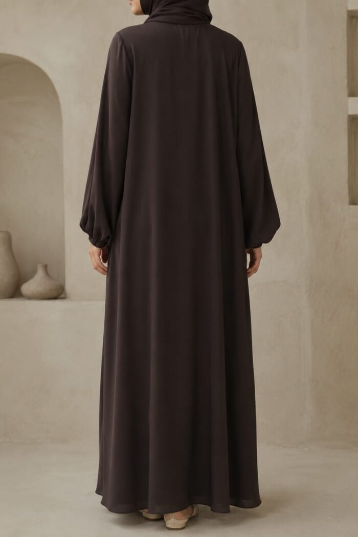 Matwaze abaya in dark grey with puff sleeve cuff - back view