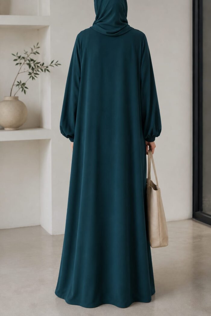 Matwaze abaya in sea green with puff sleeve cuff - back view