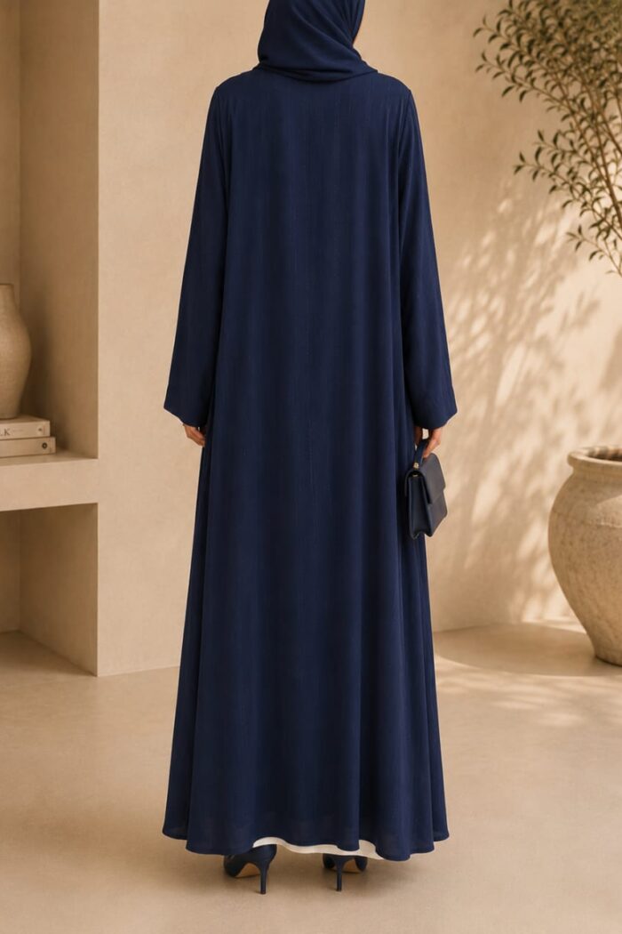 Mazdoja lining tench abaya in navy blue with white inner dress - back view