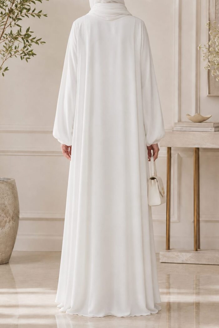 Mazdoja Plates Abaya in white, back view showing flowing silhouette