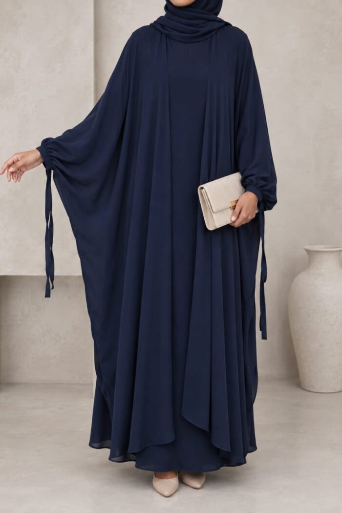 Navy blue kaftan abaya front view with ribbon cuff tie detail