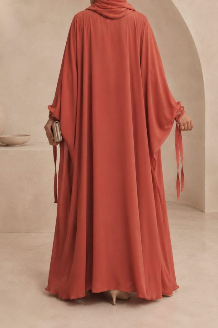 Rust orange kaftan abaya back view with ribbon cuff and matching hijab