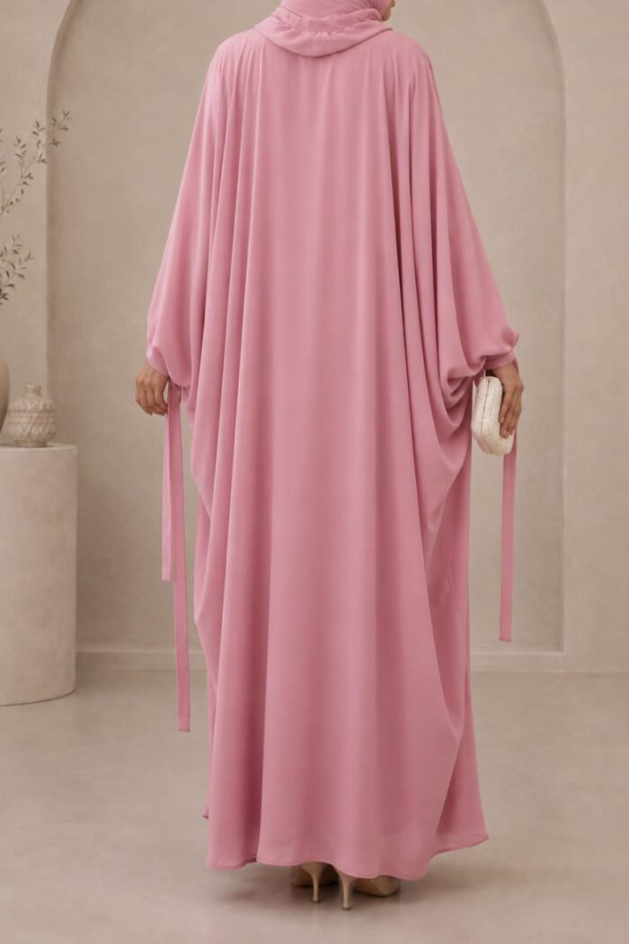 Shocking pink kaftan abaya back view with ribbon cuff and matching hijab