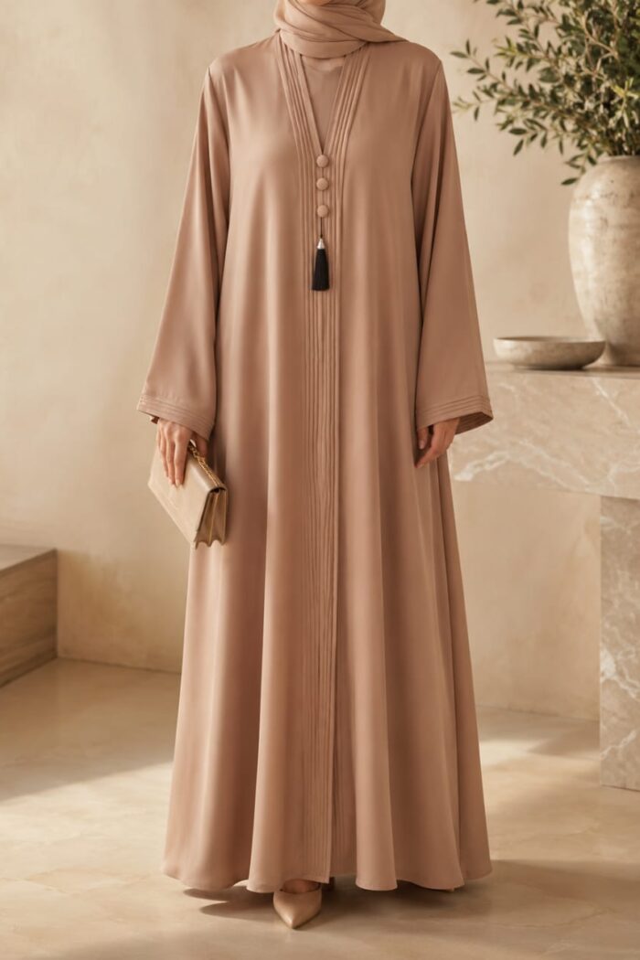Tik Tok Asri Abaya in camel brown, front view with pleated tassel closure and cuff detail