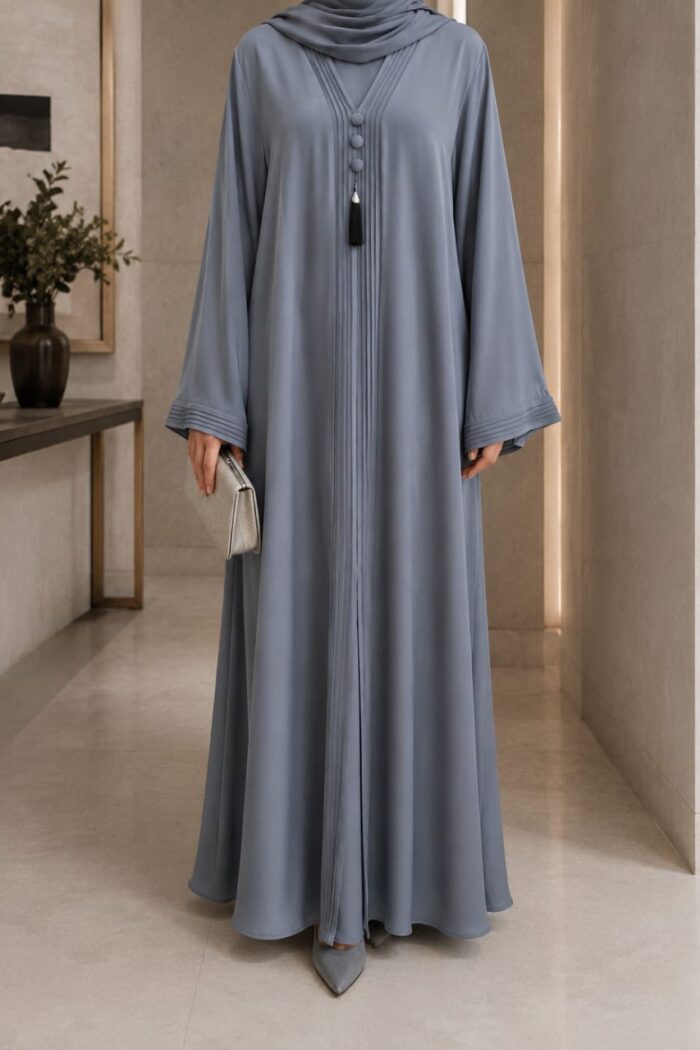 Tik Tok Asri Abaya in cashmere silver, front view with pleated tassel closure and cuff detail