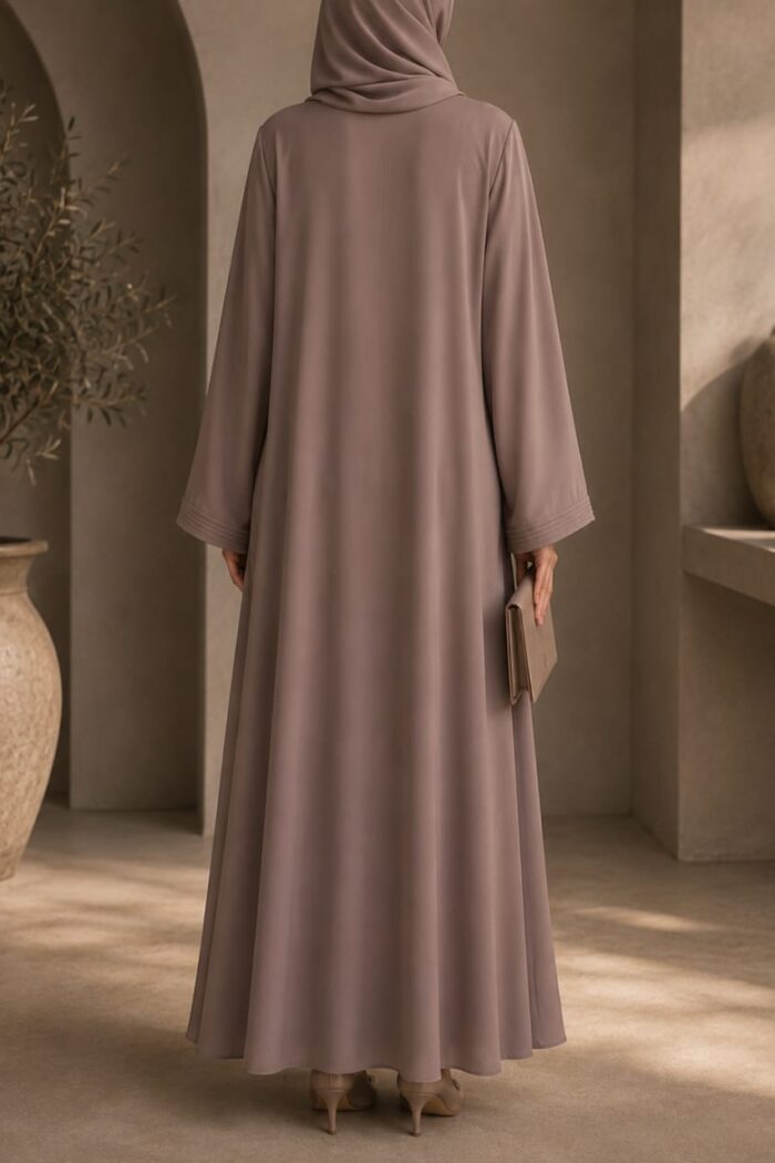 Tik Tok Asri Abaya in light grey, back view showing flowy silhouette and draped hijab