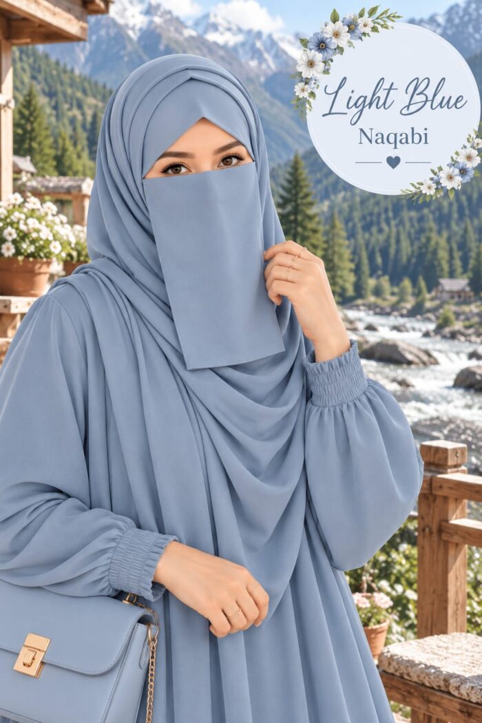 Light blue premium Dori Naqabi, a Georgette niqab covering nose and face, worn with a matching abaya