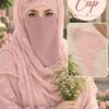 Woman wearing light pink head cap for hijab in net fabric with pearl and stone detailing, with inset of the cap