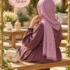 Loeew Stoler in Purple draped as a hijab